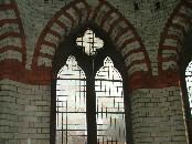 hidden from public view: window in upper part of apse