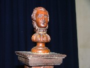 strange little head on top of the font cover