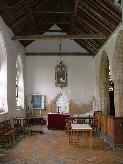 north chancel aisle with vestry door behind the altar
