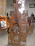 Abbess, probably St Etheldreda, in niche; Matrimony above